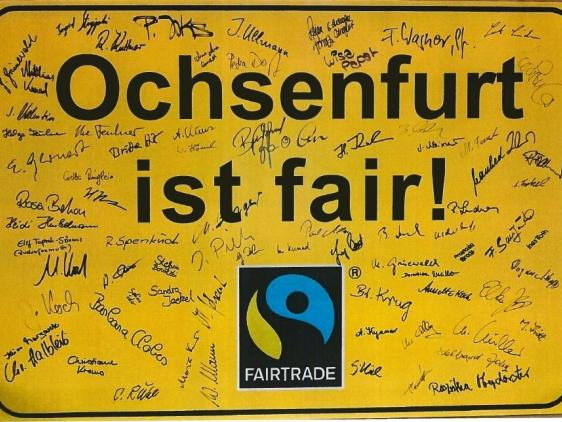 Fair-Trade Schild mit Unterschriften